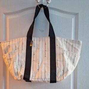 Stylish Cream Tote Bag with Black Straps